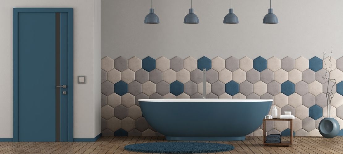 Une salle de bain en bleu canard et gris